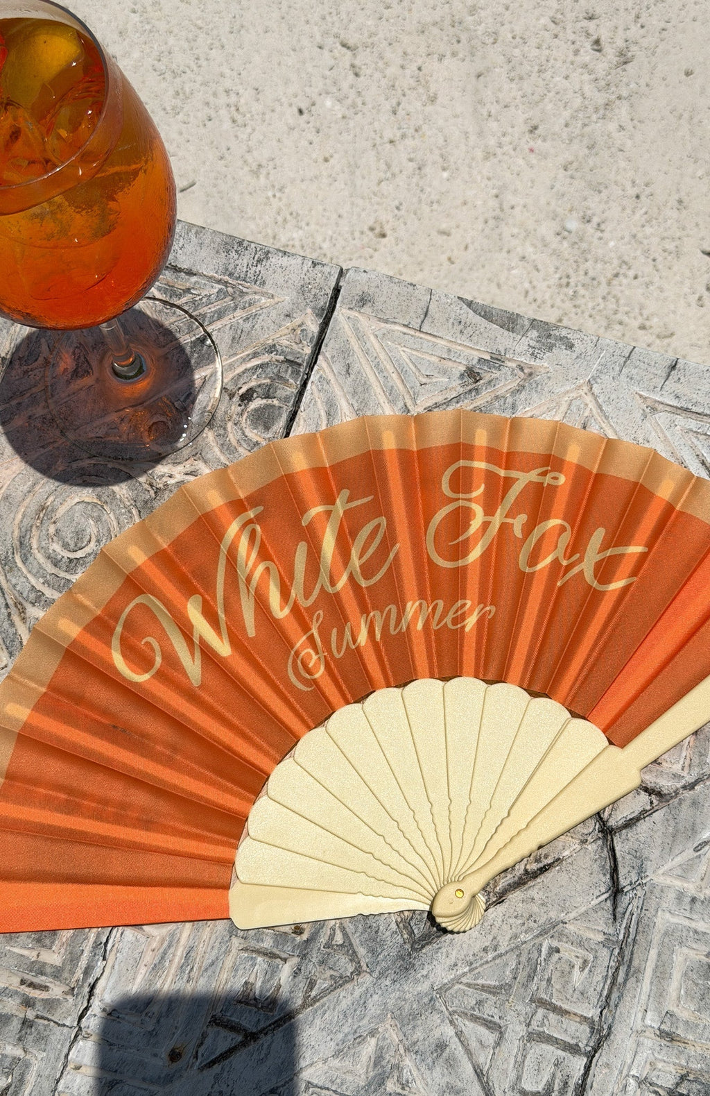 White Fox Majestic Mode Hand Held Fan Orange