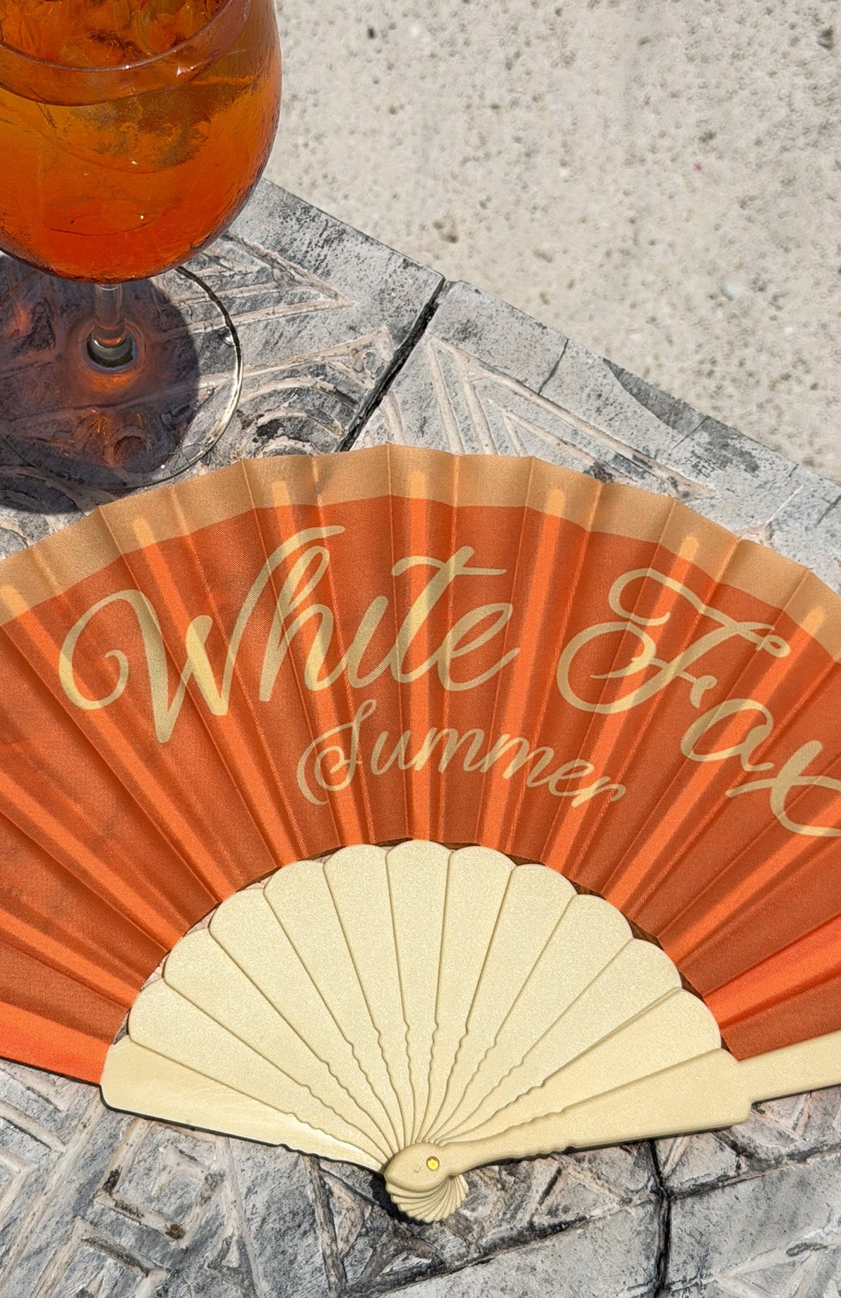 White Fox Majestic Mode Hand Held Fan Orange